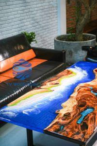 Unique natural wood resin table with blue ocean design