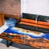 Unique natural wood resin table with blue ocean design