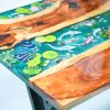 Handcrafted Koi Fish epoxy resin table, meticulously designed with crystal-clear resin, capturing the elegance of Koi fish swimming through flowing water. Combined with premium natural wood, this artistic masterpiece adds a unique touch to any space