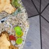 Handcrafted round coffee table for apartments, featuring iconic Koi fish, attractive gravel texture, and clear resin stream effect