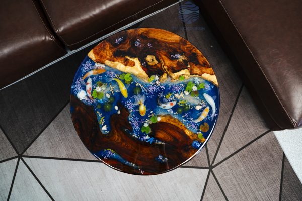 Very special Round Sofa Table with captivating Hương wood, characteristic Koi fish, mysterious deep blue sea resin, and Peach dragon-fish by TV Wood Resin