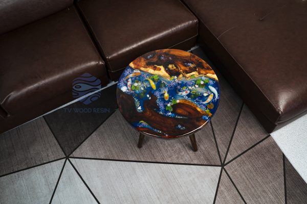 Unique wood and resin round table with captivating Hương wood grain, deep blue mystical water, characteristic Koi, and a special Peach dragon-fish element