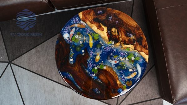Very special Round Sofa Table with captivating Hương wood, characteristic Koi fish, mysterious deep blue sea resin, and Peach dragon-fish by TV Wood Resin
