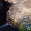 Special Round Sofa Table with characteristic Koi fish, natural burl wood knots, and mysterious moss background by TV Wood Resin