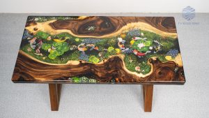 TV Wood Resin's signature Koi fish & chrysanthemum art on a Tamarind wood dining table for family kitchen