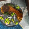 Handcrafted round Koi fish coffee table made from wood and resin with vibrant Koi fish design