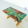 Unique office desk featuring iconic bright green Koi fish design and mystical Huong wood
