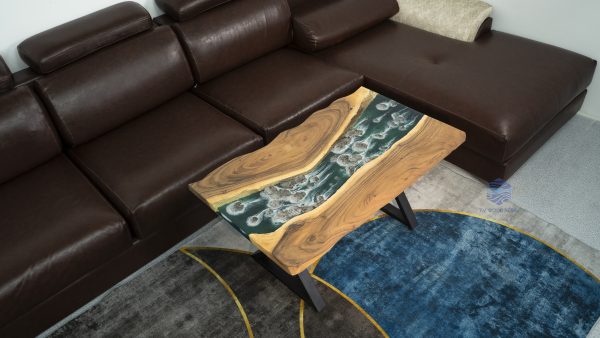 Apartment living room sofa table featuring a rock waterfall design by TV Wood Resin