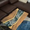 Apartment living room sofa table featuring a rock waterfall design by TV Wood Resin