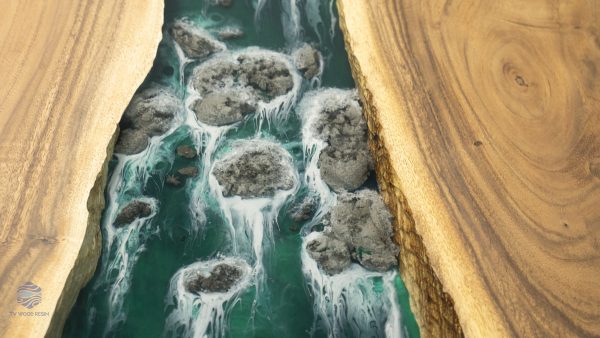 Apartment living room sofa table featuring a rock waterfall design by TV Wood Resin