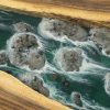 Apartment living room sofa table featuring a rock waterfall design by TV Wood Resin