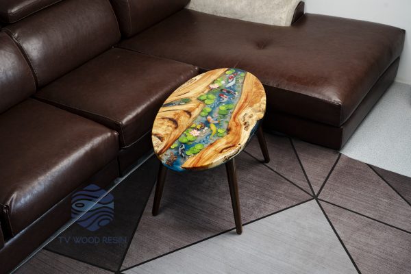 Handcrafted wood and resin oval coffee/side table featuring iconic Koi fish and yellow Tamarind wood