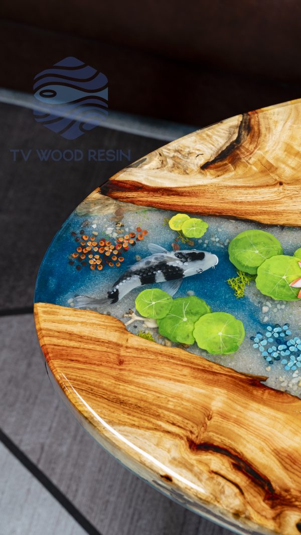 Handcrafted wood and resin oval coffee/side table featuring iconic Koi fish and yellow Tamarind wood