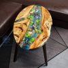 Handcrafted wood and resin oval coffee/side table featuring iconic Koi fish and yellow Tamarind wood